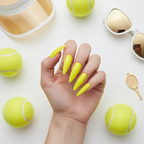 Neon yellow nails with tennis balls and sporty glam props