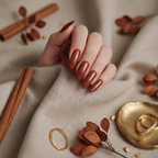 Deep terracotta-brown copper shimmer nails with autumn botanicals