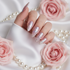 Soft ballet pink silver micro glitter nails on white satin with roses